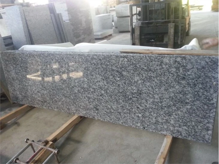 white wave granite slab